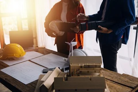 Construction concept of Engineer and Architect working at Construction Site.. Stock Photos