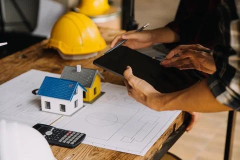 Construction concept of Engineer and Architect working at Construction Site.. Foto stock