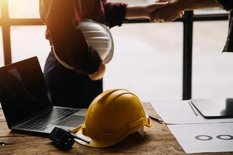 Construction concept of Engineer and Architect working at Construction Site.. Stock Photos