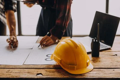 Construction concept of Engineer and Architect working at Construction Site.. Foto stock