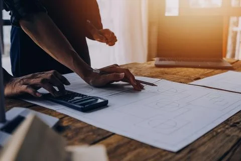 Construction concept of Engineer and Architect working at Construction Site.. Stock Photos