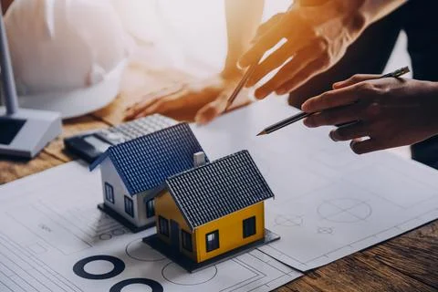 Construction concept of Engineer and Architect working at Construction Site.. Stock Photos