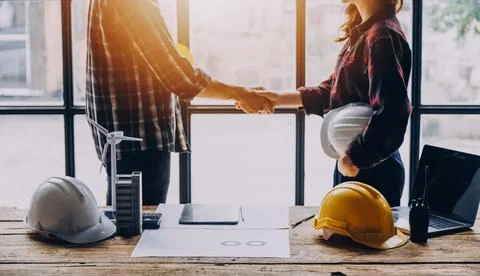 Construction concept of Engineer and Architect working at Construction Site.. Stock Photos