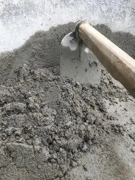 Construction concept, The mixing of stone, Cement, Sand together to make a .. Stock Photos