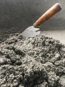 Construction concept, The mixing of stone, Cement, Sand together to make a .. Stock Photos