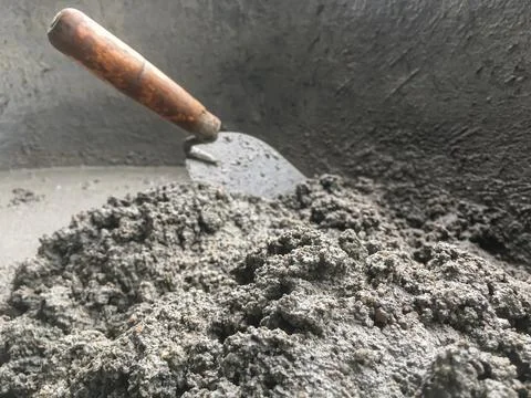 Construction concept, The mixing of stone, Cement, Sand together to make a .. Stock Photos