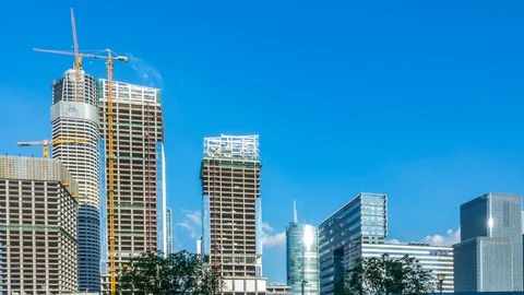 Construction of concrete buildings on background moving clouds，time lapse 스톡 동영상 78146653