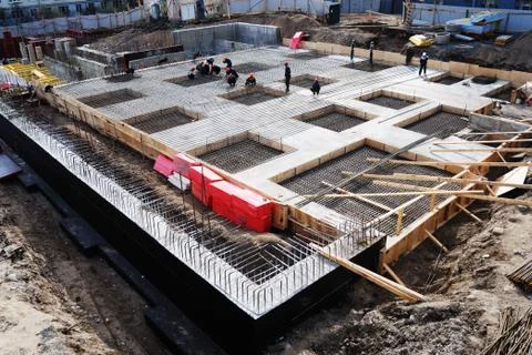Construction of concrete foundation of building Stock Photos