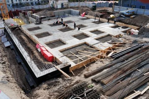 Construction of concrete foundation of building Stock Photos