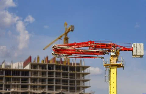 Construction concrete pump on the background construction site Stock Photos