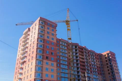 Construction, construction of multi-storey residential building. house under  Stock Photos
