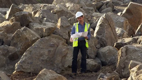 Construction, Construction Site, Outdoors, Day, Rock, Engineer, Looking, Stock Footage 94019545