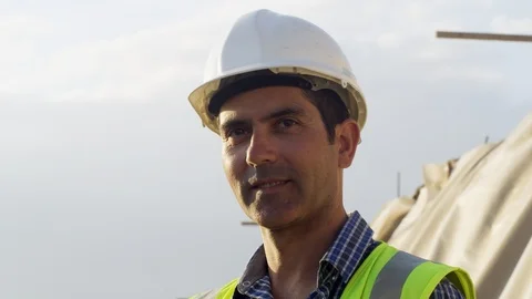 Construction, Construction Site, Outdoors, Day, Looking At Camera, Smiling, Stock Footage 94019628