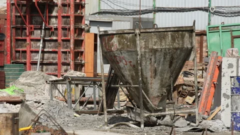 Construction container for cement mortar stands motionless on construction site Video stock 172225082