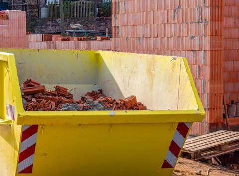 Construction container with rubble from the shell Stock Photos