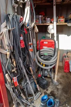 In a construction container there are various tools and work equipment Stock Photos