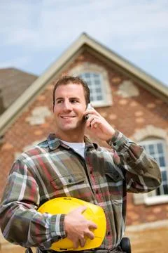 Construction: contractor on the phone Stock Photos