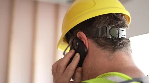 Construction Contractor Worker Talking On the Phone With a Client Stock-Footage 242620070