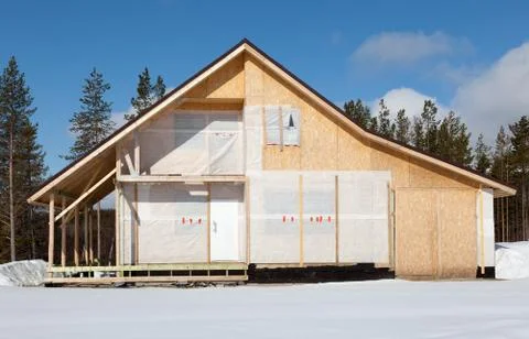 Construction cottage in the forest area Stock Photos