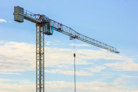 Construction crane against the background of the evening sky Foto stock