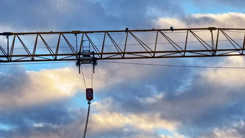 Construction Crane Against a Dramatic Sky Stock Footage 274434447