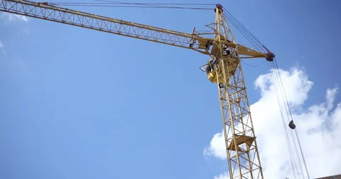 Construction. Crane against the sky with clouds. Stock Footage 53857576