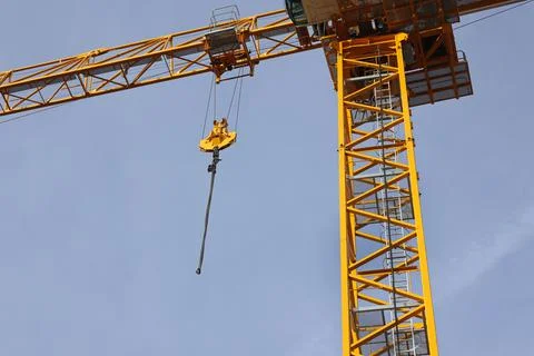 Construction crane against the sky Stock Photos