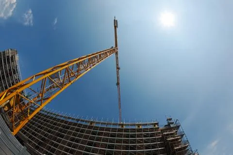 Construction crane and building Stock Photos