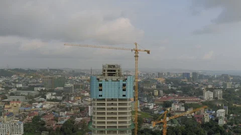 Construction Crane and building process in Cambodia Sihanoukville city 스톡 동영상 119365307