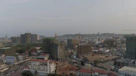 Construction Crane and building process in Cambodia Sihanoukville city 動画素材 119368077
