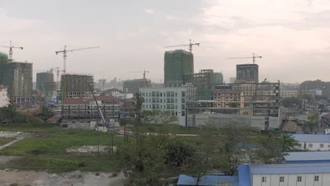 Construction Crane and building process in Cambodia Sihanoukville city Stock Footage 119521203