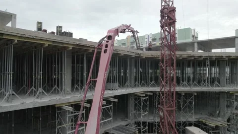Construction crane and concrete supply crane during the construction Stock Footage 219687212