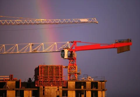 Construction crane and rainbow Fotos de archivo