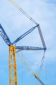 Construction crane at blue sky as background Stock Photos