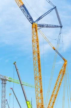 Construction crane at blue sky as background Stock Photos