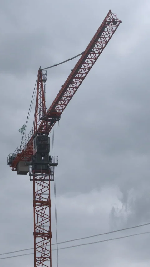 Construction crane boom arm rotates Stock Footage 340411429