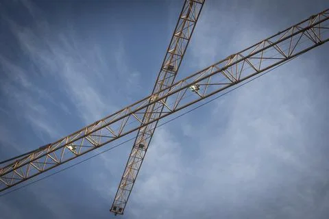 Construction crane in building industry Stock Photos