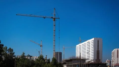 Construction crane building new homes Foto stock