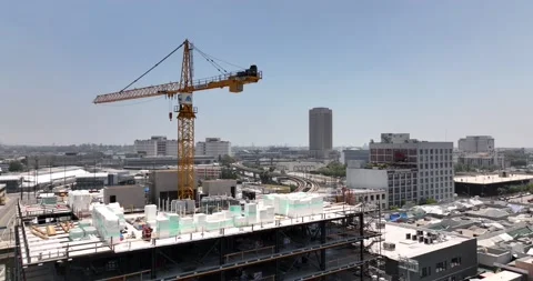 Construction, crane builds a house, commercial real estate, 4K drone Stock Footage 238587003