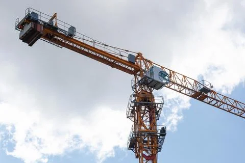 Construction crane cabin close up on the background of the sky. Construction Stock Photos