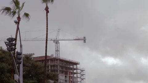 Construction crane cloudy urban city. Stock Footage 75060029