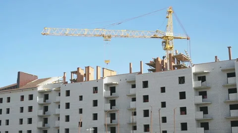 Construction crane delivers the bricks to object Stock Footage 61503680