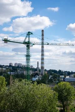 The construction crane is designed for the construction of new residential co Stock Photos