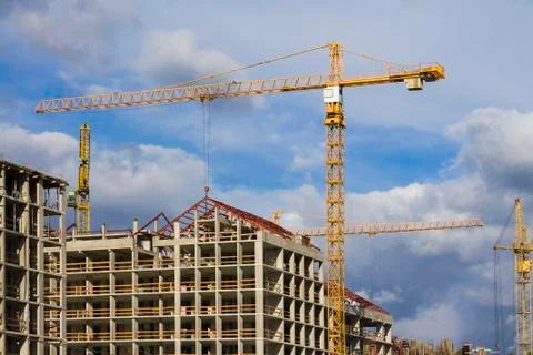 Construction crane on development site. No people. Stock Photos