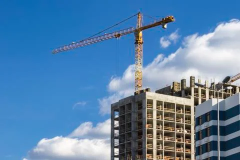 Construction crane on development site. No people. Stock Photos