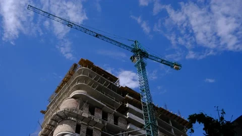 Construction crane during the construction of a high-rise building Vídeos de archivo 201489787