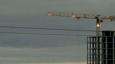 Construction crane in the evening Stock Footage 80717411