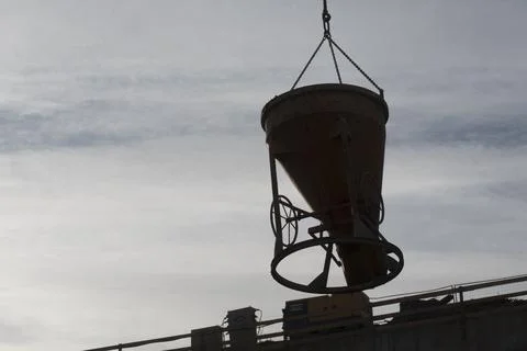 Construction crane with heavy load Stock Photos