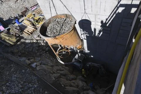 Construction crane with heavy load Stock Photos