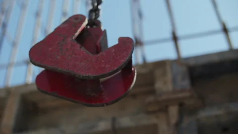 Construction crane hook at building site Stock Footage 314645411